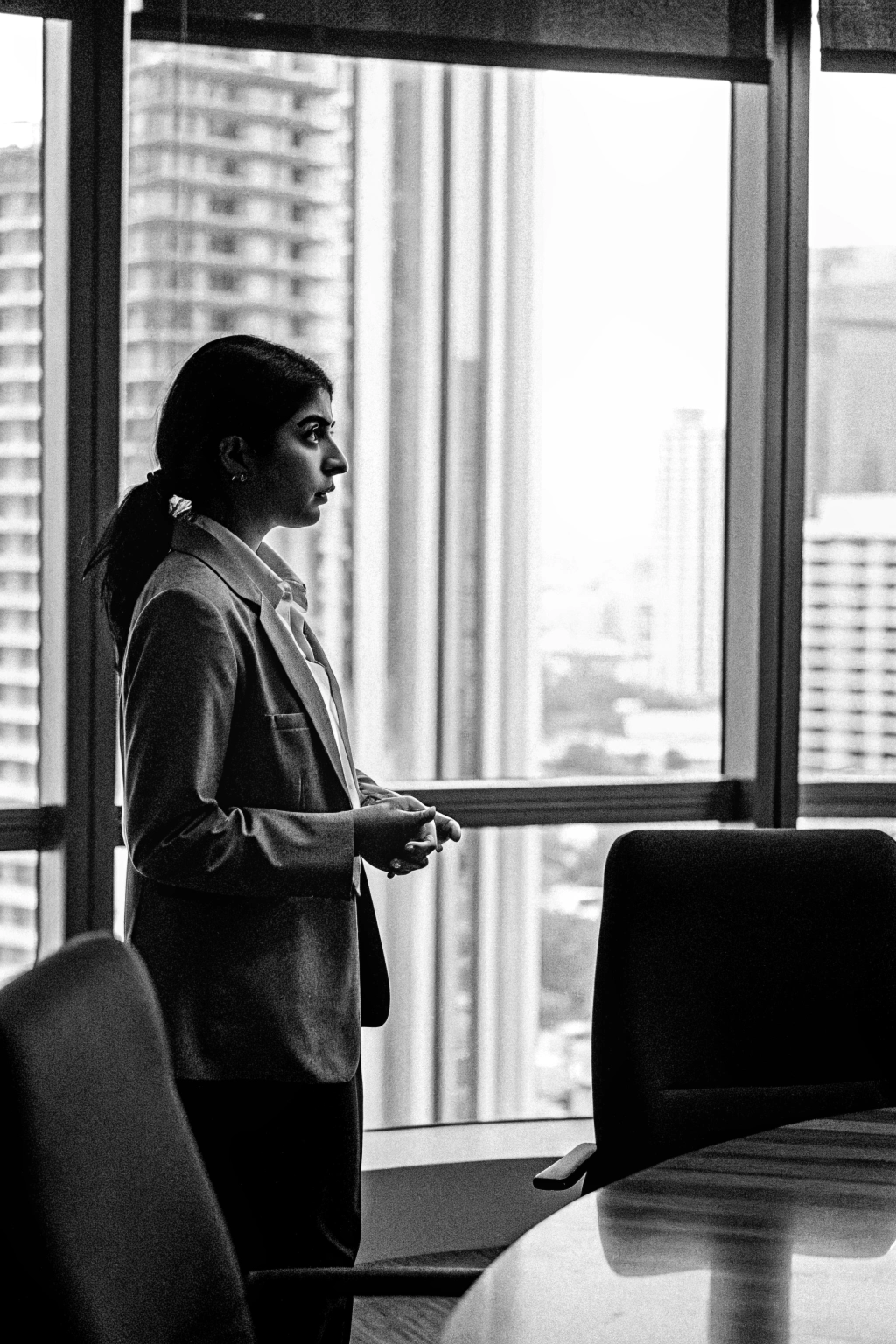 Indian woman asking question in office environment